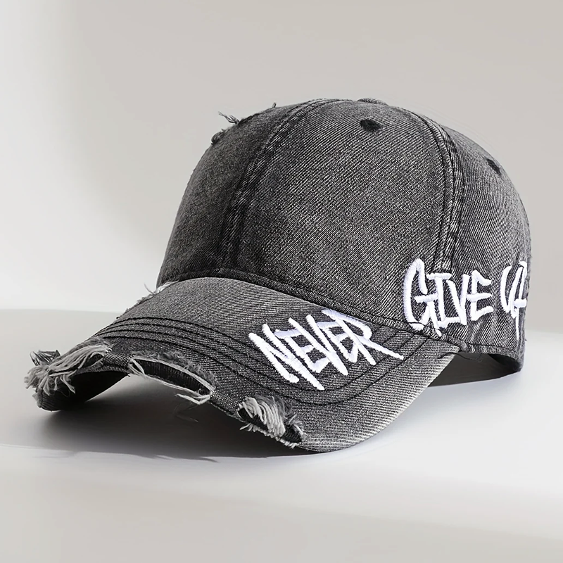 Sliten denimkeps i baseballstil med broderi Never Give Up