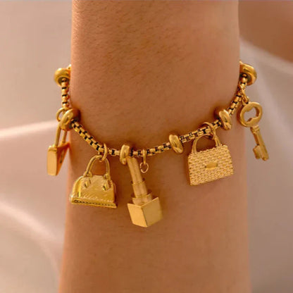 Aurelia guldpläterat berlockarmband